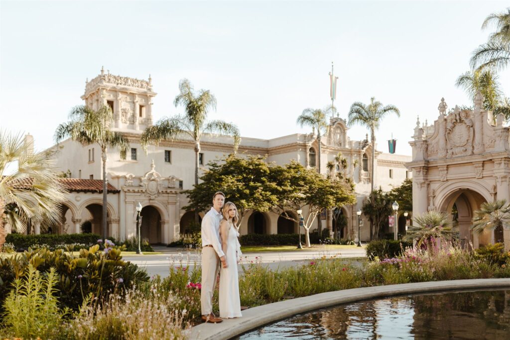 Engaged couple sharing a quiet moment during their Golden Hour Engagement at Balboa Park