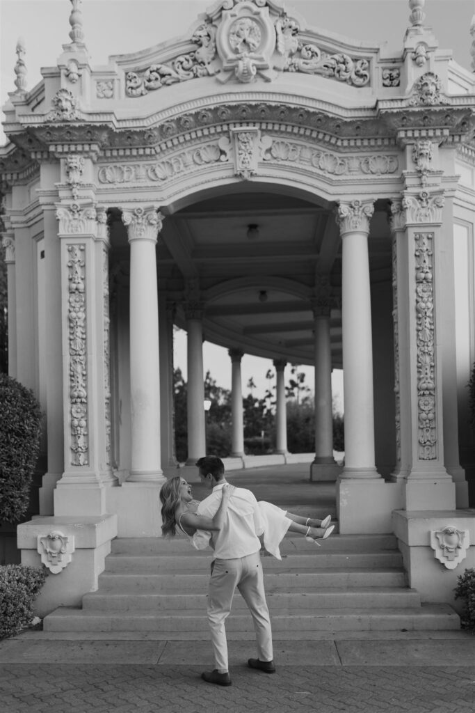 Engaged couple sharing a quiet moment during their Golden Hour Engagement at Balboa Park